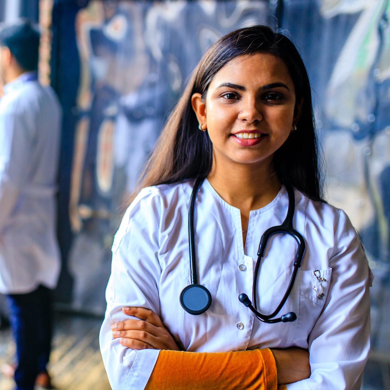 Mixed race Asian doctors and nurse at the office .